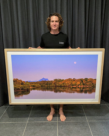 "Blood Moon Setting" fine art print in a natural oak frame with non reflective glass